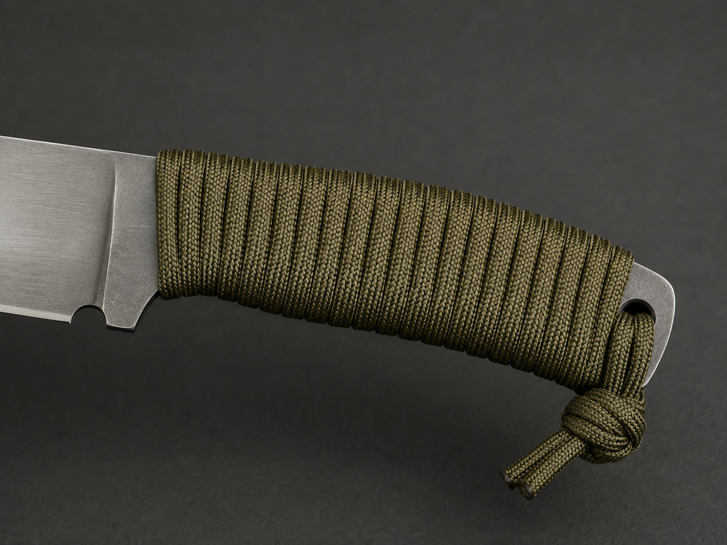 Close-up display of paracord wrapped knife handle material