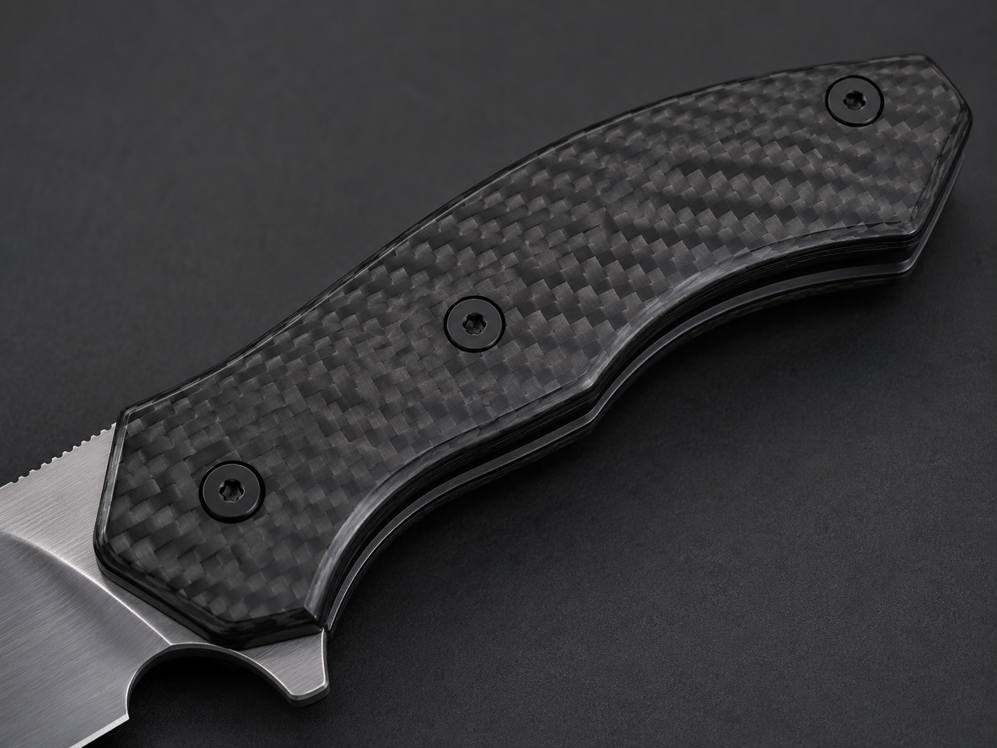 Close-up display of carbon fiber knife handle material